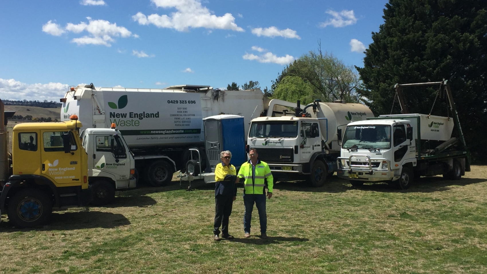 Malcolm and Howard Lancaster from New England Waste with their fleet of waste removal vehicles